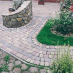 Nested,Pavers,Of,Various,Colors,,Around,The,Grass,Is,Green,